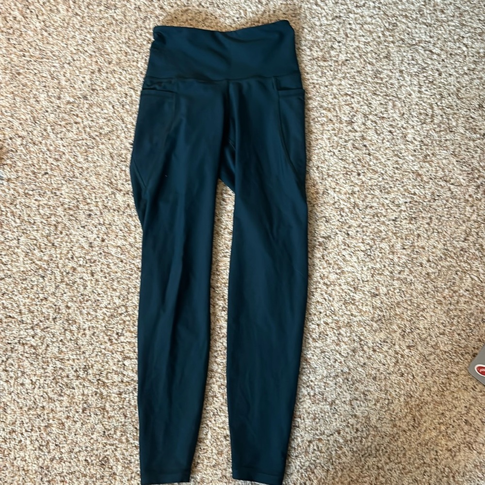 forest green/blue leggings, has pockets, 7/8 length